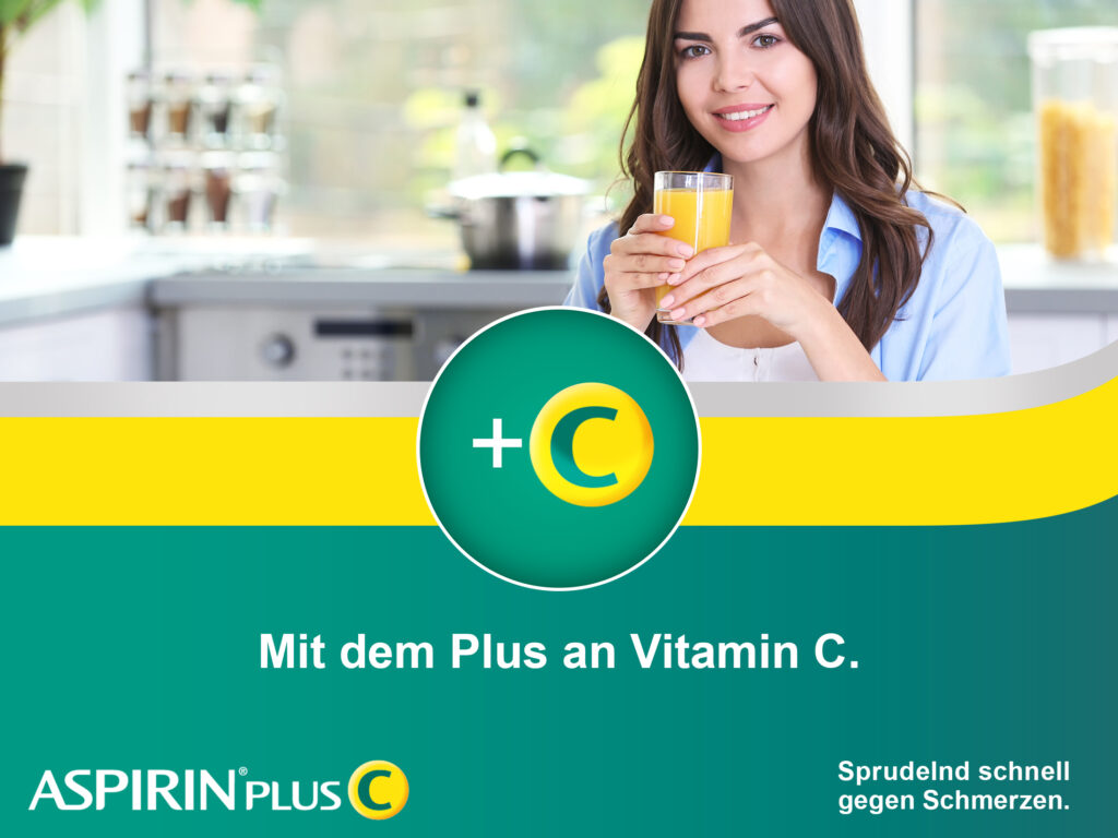 Aspirin Werbeanzeige Frau mit Orangenglas für eine extra Portion Vitamin C